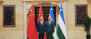 张钰晶会长应邀赴新疆同乌兹别克斯坦共和国总理阿里波夫举行工作会谈