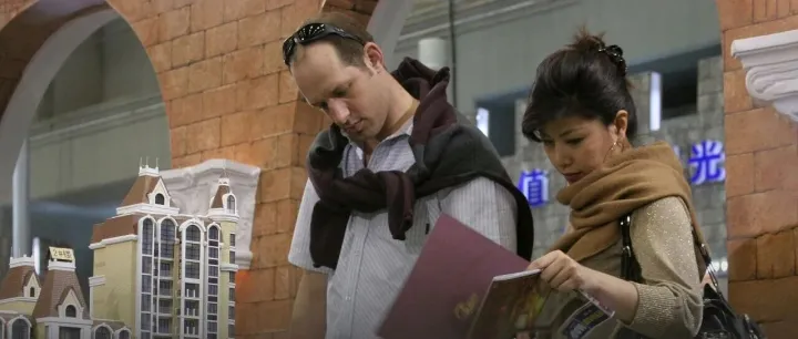 China Eases <em>Property</em> Purchases for Overseas Individuals