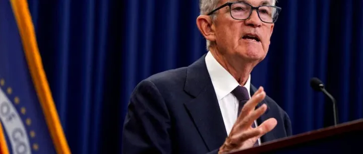 Fed's Powell addresses economy pulled between <em>risks</em> to growth