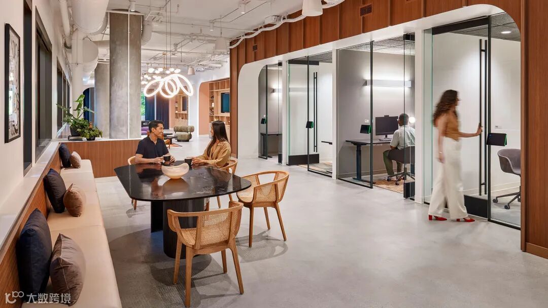 A group of people in a room.