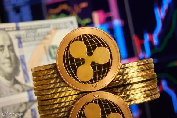 Gold coins with the XRP logo in front of large-denomination dollar bills.