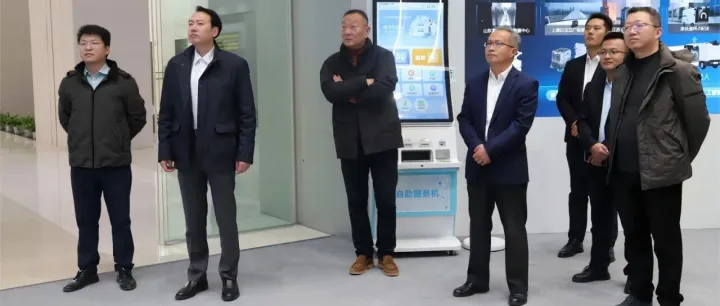 史庆军接待上海市档案局副局长、上海市档案馆副馆长潘旭山一行