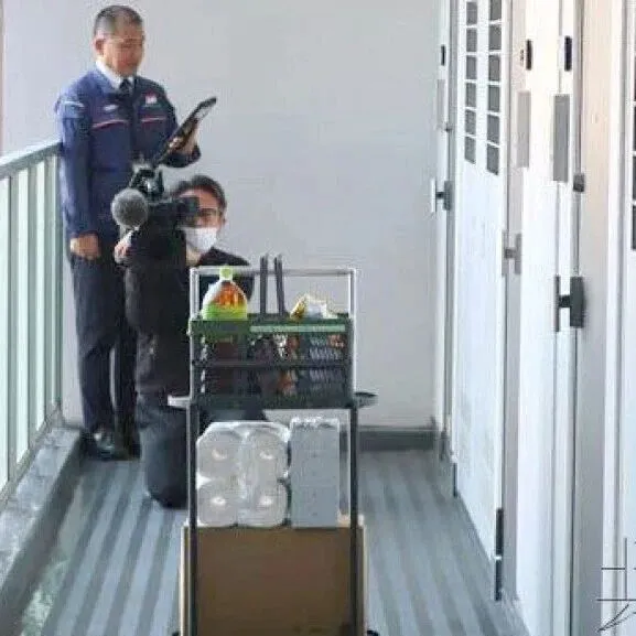 三菱电机子公司展示机器人在公寓楼内送货的试验