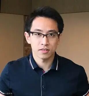 A person posing for the camera
Description automatically generated