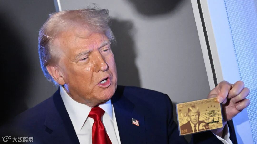 President Donald Trump holds the $5 million dollar Gold Card as he speaks to reporters while in flight on board Air Force One, en route to Miami, Florida on April 3, 2025. Trump is travelling to the Trump National Doral Golf Club before going to his Mar-a-Lago Resort.