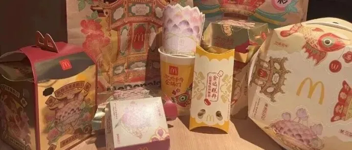 有人赞“年味”有人嫌“诡异”，麦当劳非遗灯彩设计为何陷两级争议？