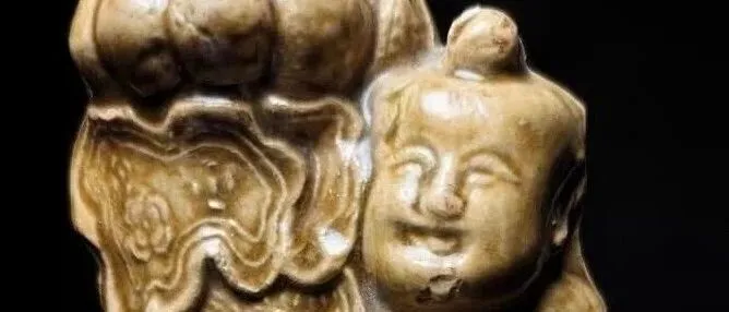 千年古灯里的“莲生贵子”