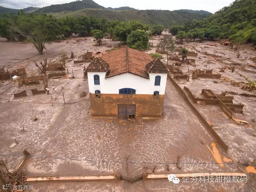 A Brazilian village engulfed in mud after an iron ore dam burst in the country's biggest environmental accident