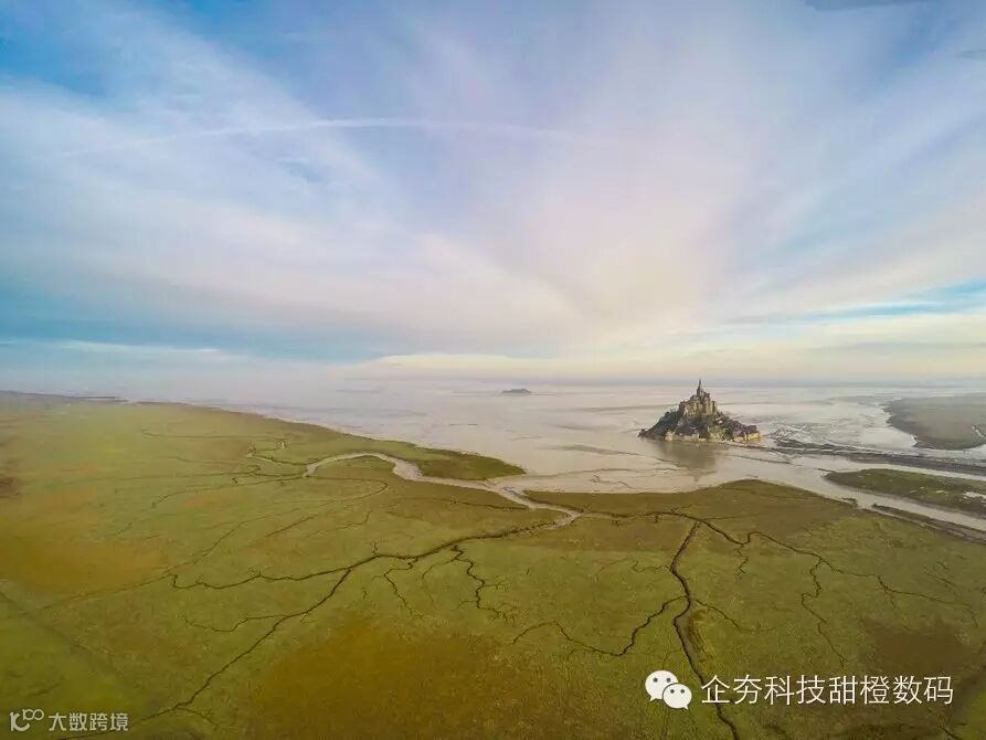 A photo of France's Mont Saint Michel island commune off the coast, taken at high tide