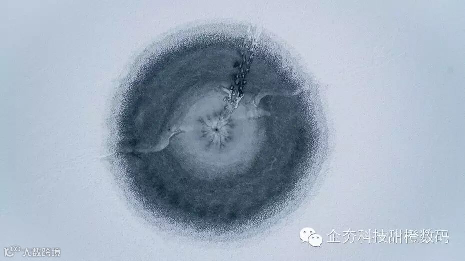 The hole drilled in frozen lake by fisherman in Turgoyak, Miass, Russia