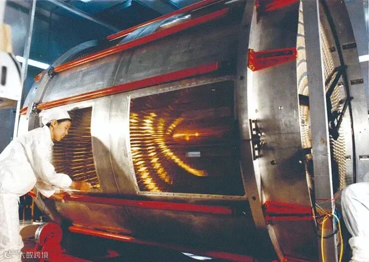 A researcher installs a spectrometer during Stage 1 construction of the Beijing Electron-Positron Collider in this archival photo. From China Science Daily