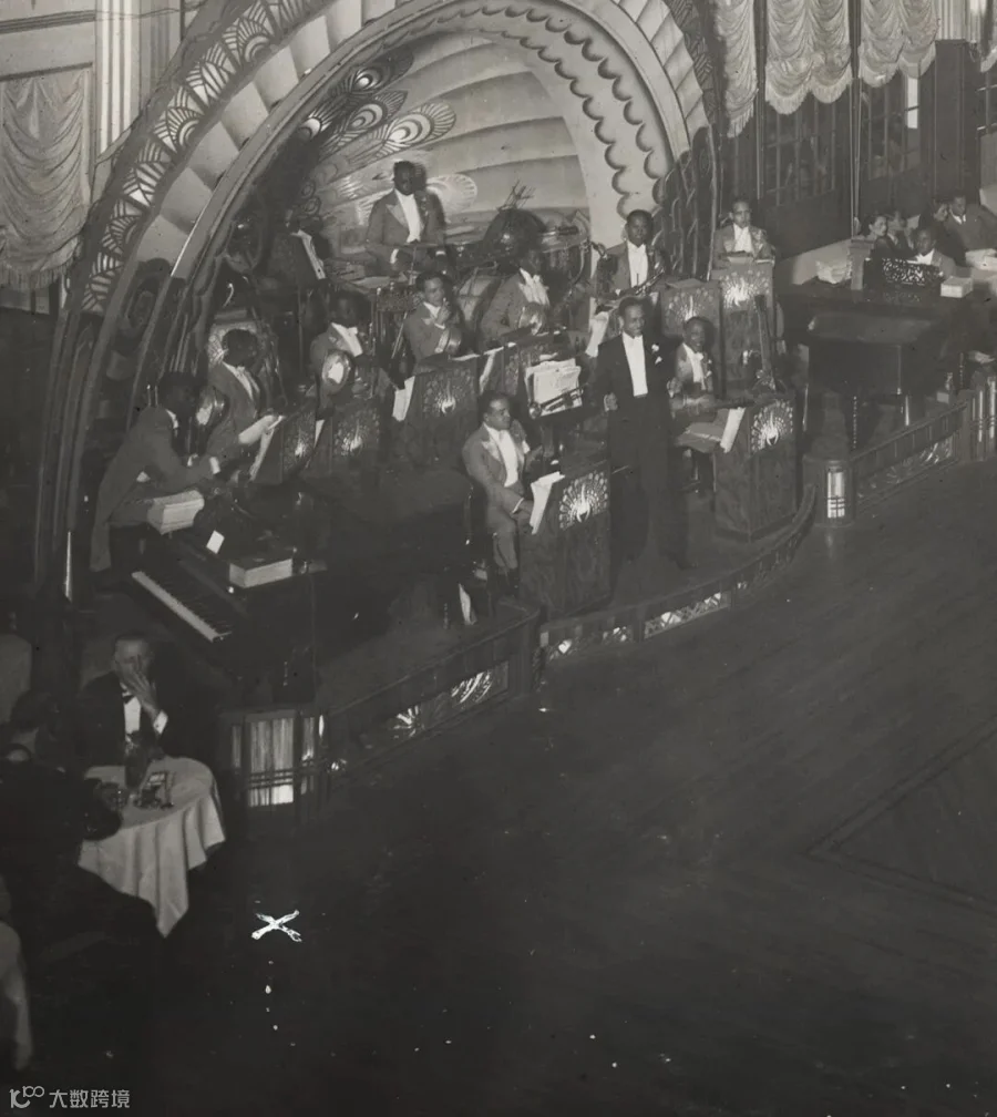A detail of a photograph shows Buck Clayton and his Harlem Gentlemen performing before an audience at the Canidrome Ballroom. The inscribed “X” and dotted line (partial) show where the fight between Clayton and the white U.S. marine took place. From the LaBudde Special Collections, University of Missouri–Kansas City