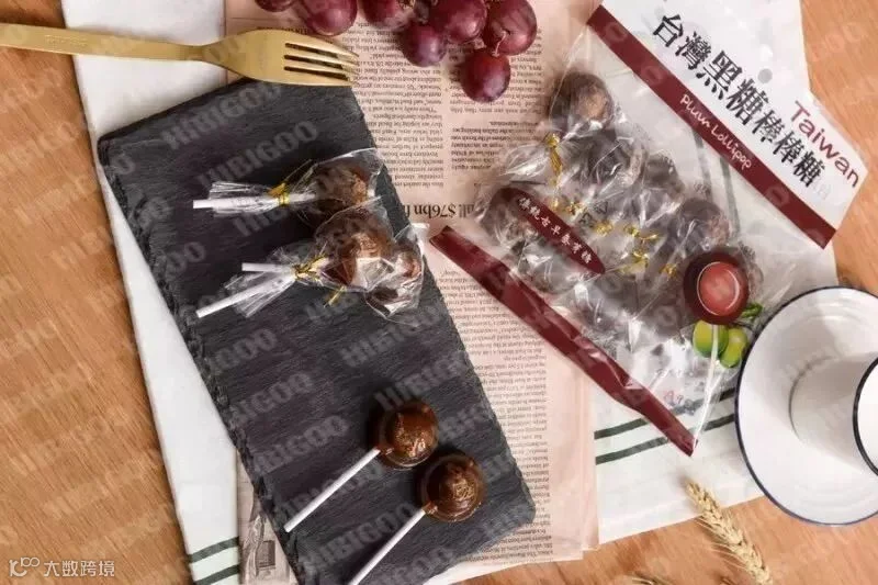 巧益牌黑糖棒棒糖.JPG