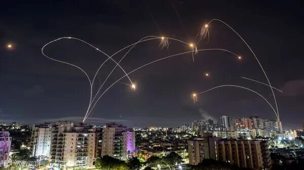 Israel"s Iron Dome anti-missile system intercepts rockets launched from the Gaza Strip, as seen from Ashkelon (REUTERS)