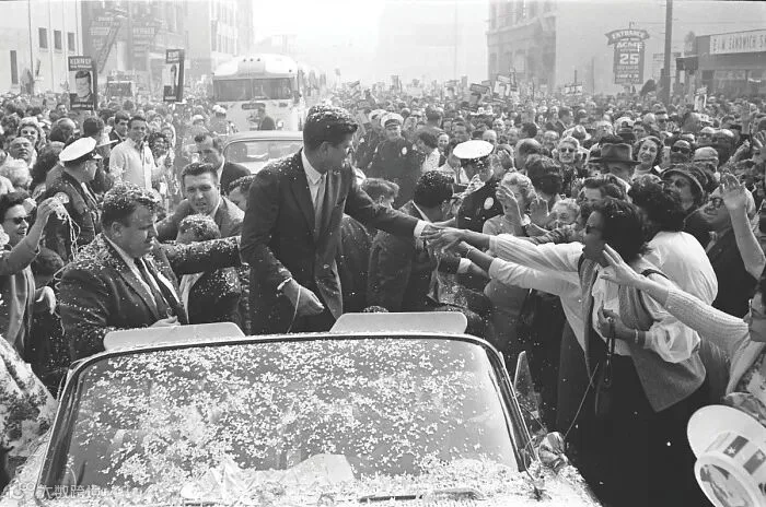 Digital image of President John F. Kennedy in a car with a crowd of people  | National Museum of African American History and Culture