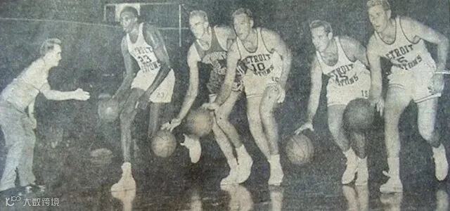 Coach Charles Eckman runs five of his players through drills in 1957 as the team prepared for their first season in Detroit.