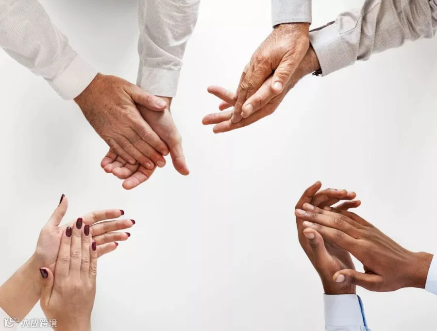Photo of People Clapping Their Hands