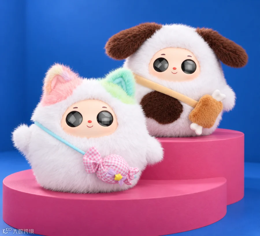 Two expressive AI plush companions on a blue and pink set