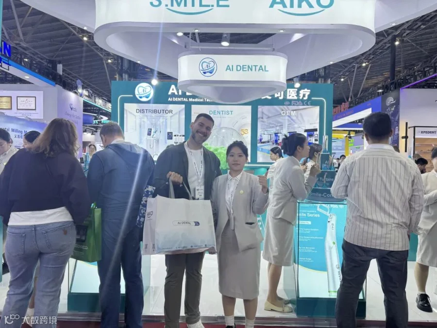 AI DENTAL sales representative with customers at DenTech China 2026