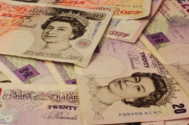 100美元兑英镑的汇率是多少？